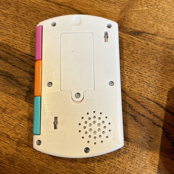 Multi-pack take along toys. Includes remote, phone and misc. book type toy. - Picture 7 of 11